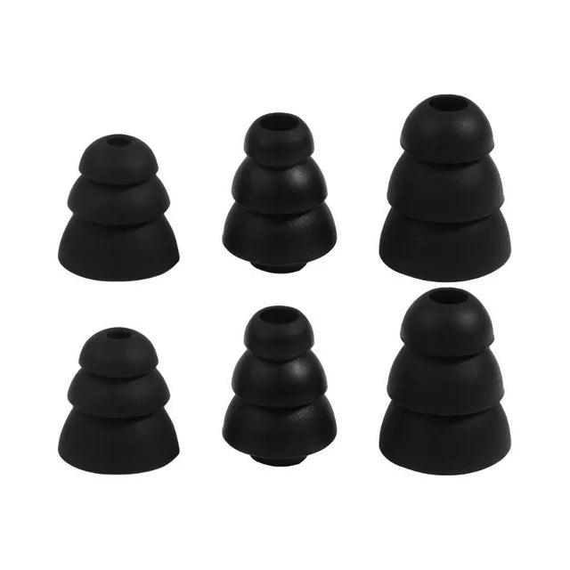 A set of six Decibullz REPLACEMENT Triple Flange Open Silicone Ear Tips Black arranged in two rows of three. Each pair consists of progressively larger sizes from left to right, featuring three-tiered cone shapes designed as replacement ear tips for in-ear headphone use.