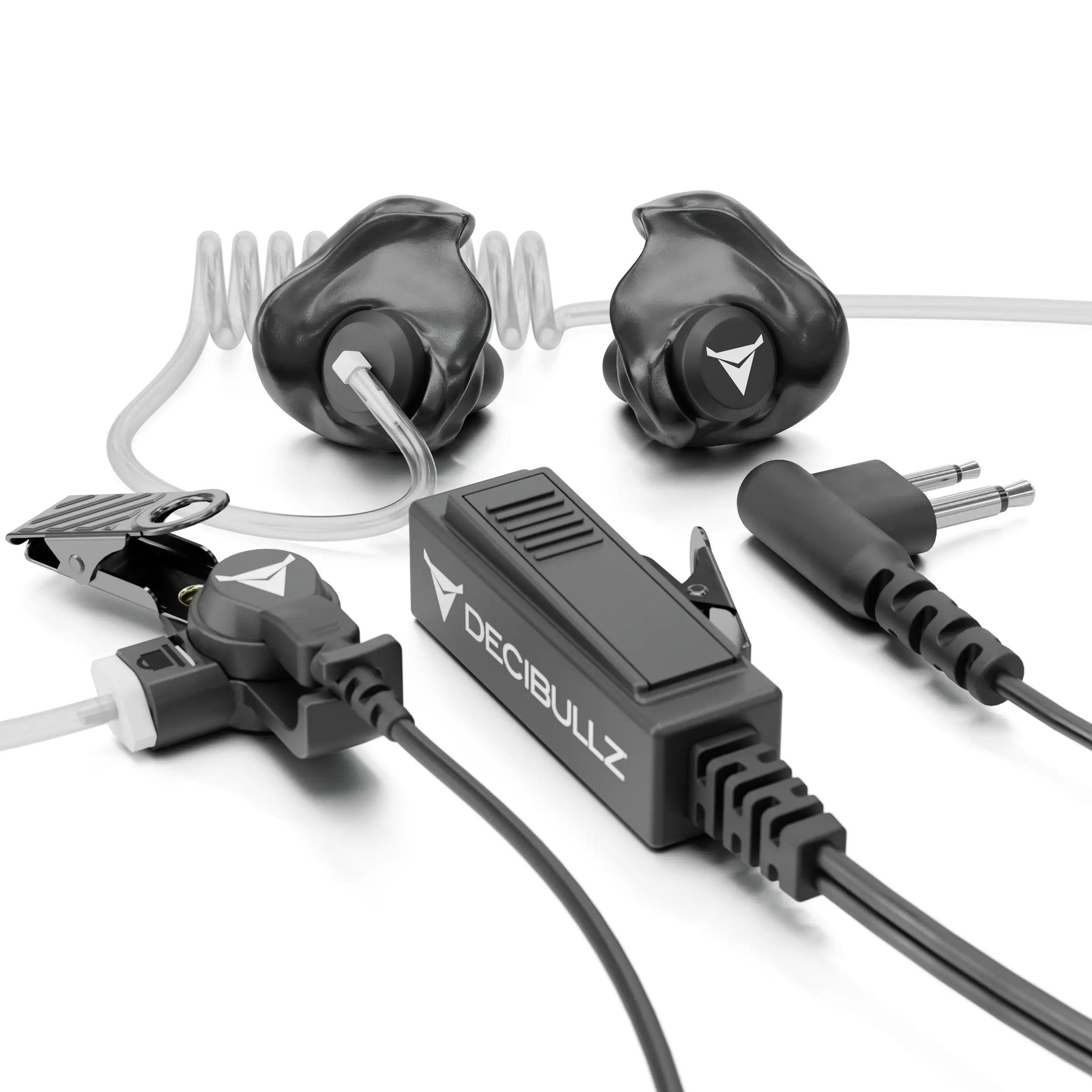 An image displays a set of Decibullz +Isolation Custom Molded Two-Way Surveillance Acoustic Tube Headset (Motorola) with black earpieces, connectors, and a small control box. Various cables and attachments are also visible, including a coiled tube and a two-pronged adapter, showcasing the Custom Moldable Radio Earpieces designed for optimal noise reduction.